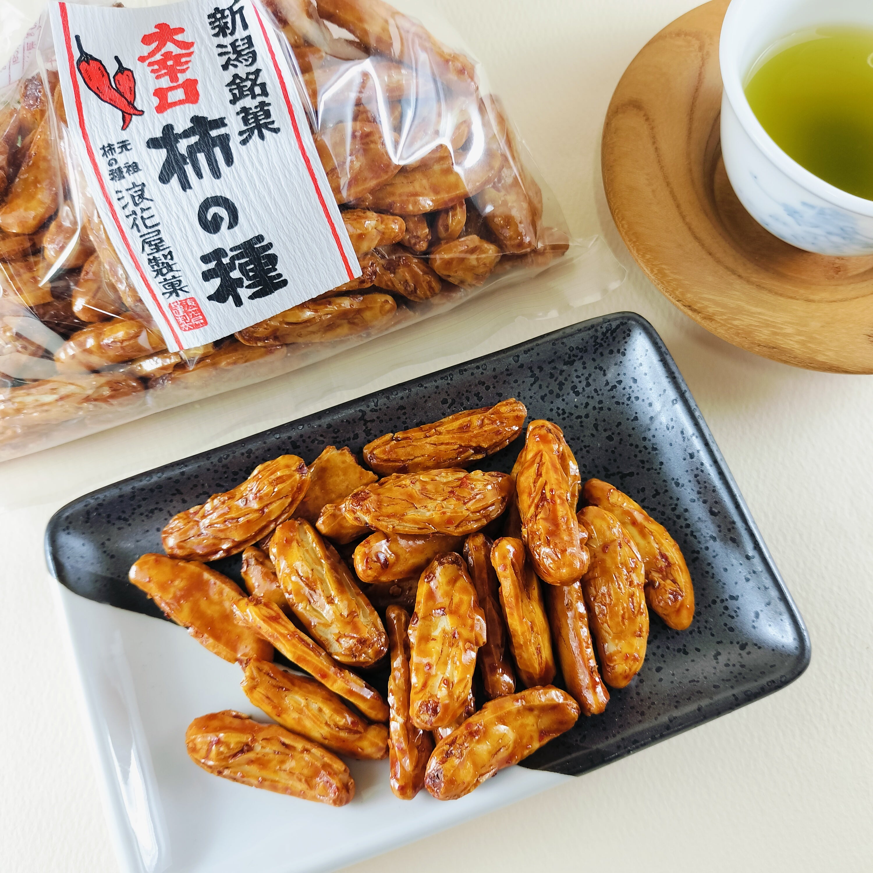 巾着 大辛口柿の種 – 新潟県観光物産オンラインショップ